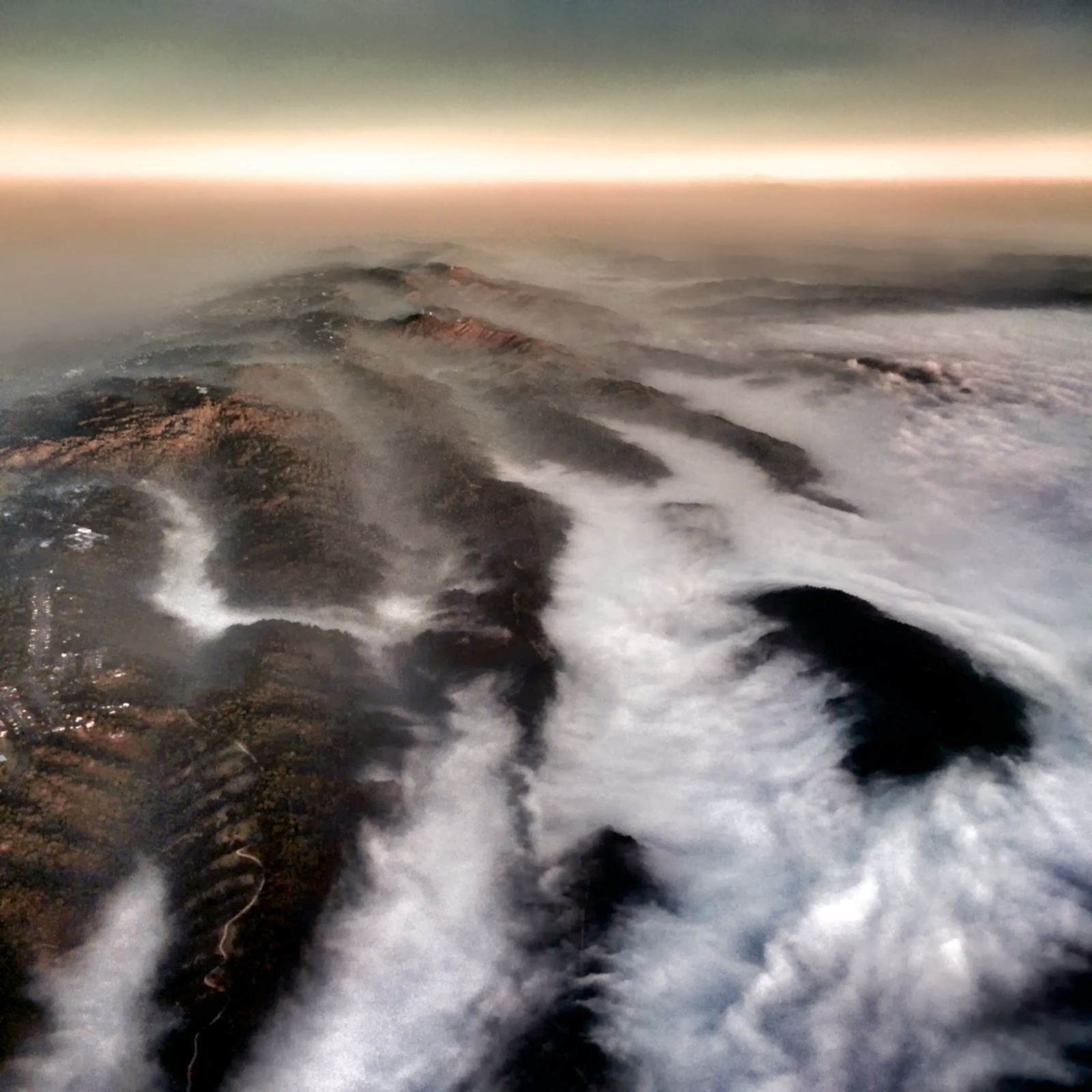 http://thedigitalstory.com/2015/01/16/Fog-Over-Valleys.jpg